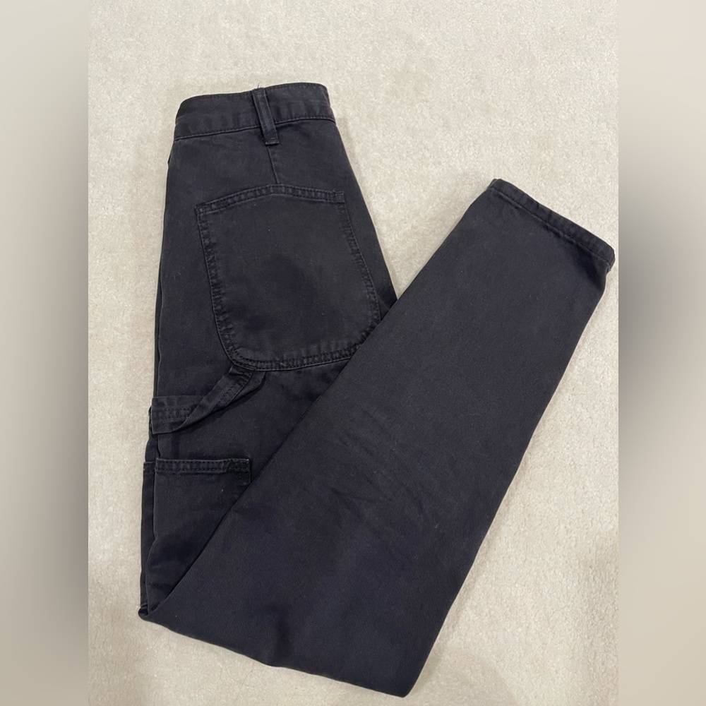 Black jeans in size S (25) with utility detailing